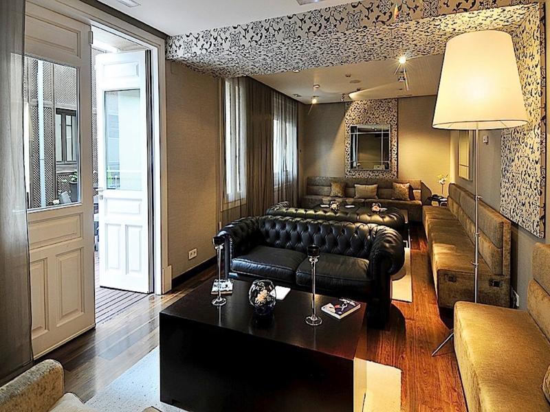 Hospes Puerta De Alcala, A Member Of Design Hotels Мадрид Экстерьер фото The interior of a suite at the Mandarin Oriental, Munich